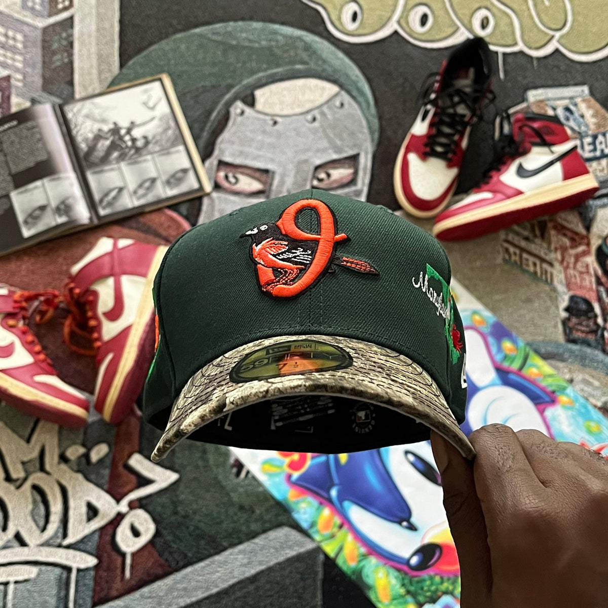 FOREST GREEN TWO-TONE CAMO BRIM (GREY UV) BALTIMORE ORIOLES 2026 CITY SIDE PATCH FITTED HAT