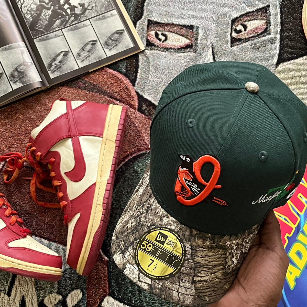 FOREST GREEN TWO-TONE CAMO BRIM (GREY UV) BALTIMORE ORIOLES 2026 CITY SIDE PATCH FITTED HAT