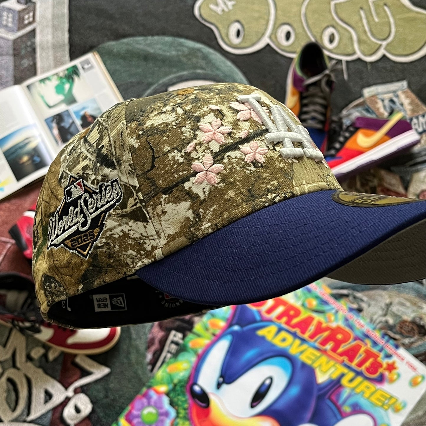 REAL TREE CAMO LOS ANGELES DODGERS 2025 WORLD SERIES SIDE PATCH (GREY UV) "NOT LIKE US" FITTED HAT